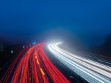 A blur of lights showing a busy motorway in both directions
