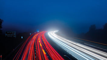 A blur of lights showing a busy motorway in both directions