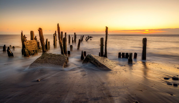 The sun setting over the Kilnsea coast