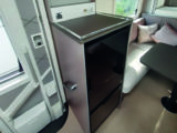Space for a TV over the fridge and the workshop here might be useful