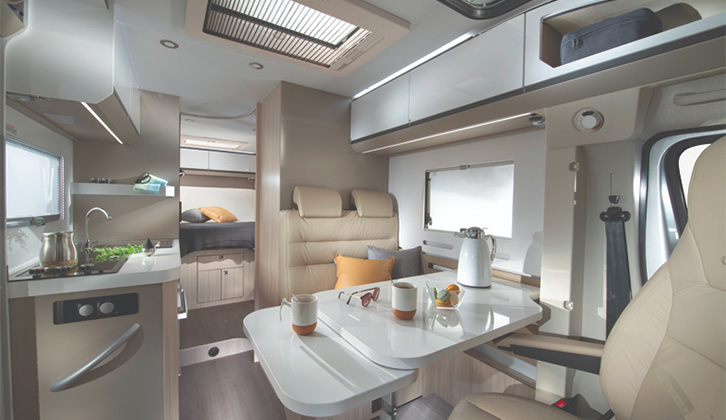 The lounge area in the Adria Compact SC Supreme