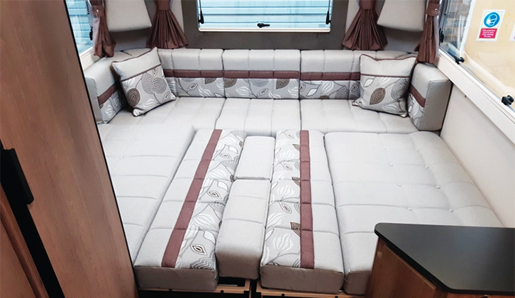 The made up double bed in the Auto-Sleeper Broadway EL