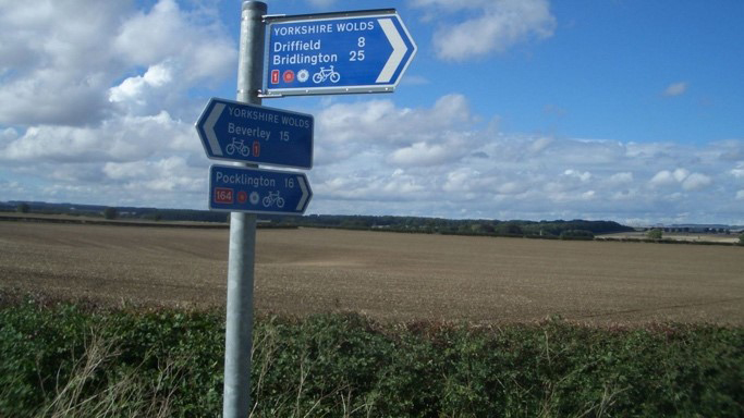 A sign post pointing to Driffield and Bridlington