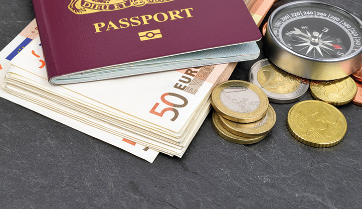 A passport and a selection of Euros