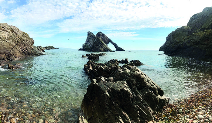 Precarious sea arch on the clifftop at Portknockie