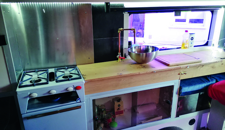 Contemporary design in the kitchen includes the snazzy bowl sink and natural wood worktops