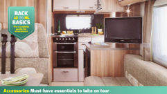 A TV set up on a sideboard in a motorhome