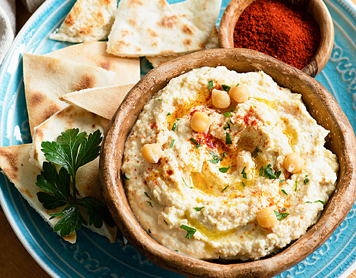 The hummus with chickpeas and paprika sprinkled on top