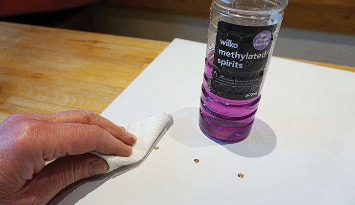 Methylated spirits being used on the table