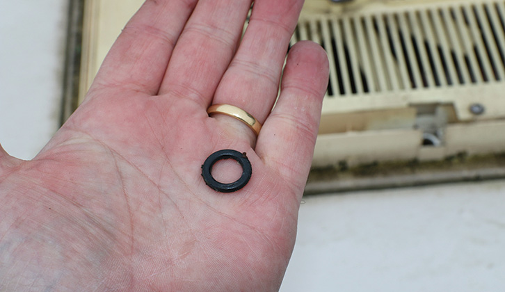 The O-ring in the palm of a hand