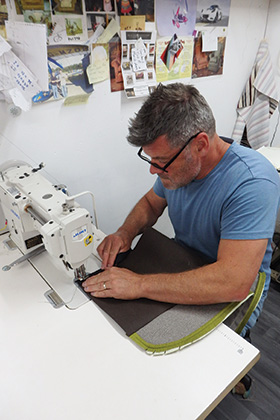 A man on a sewing machine