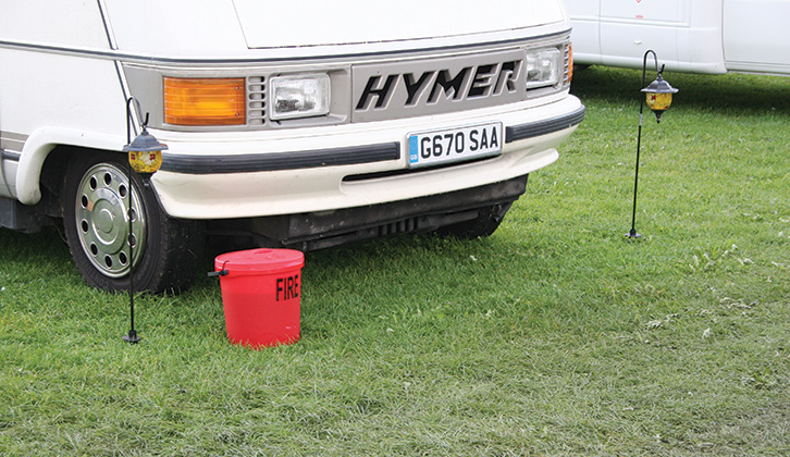 A fire bucket by a Hymer motorhome