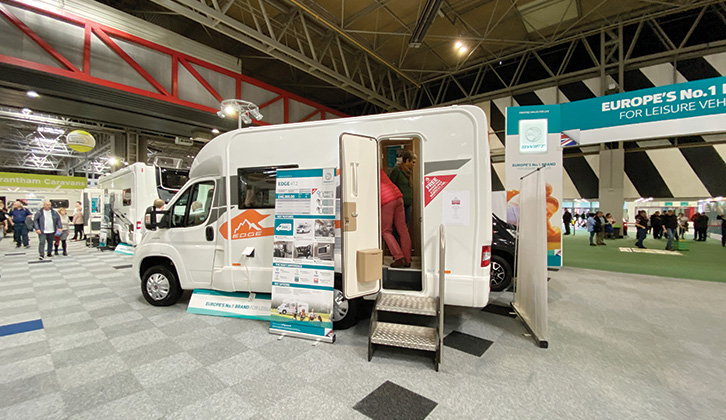 A motorhome on display at a trade show