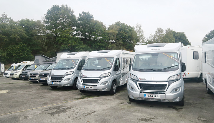 Motorhomes lined up at a dealership