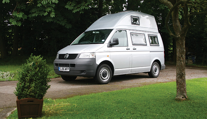 A van conversion with a high fixed roof