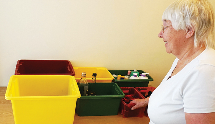 A selection of plastic boxes with different products in them