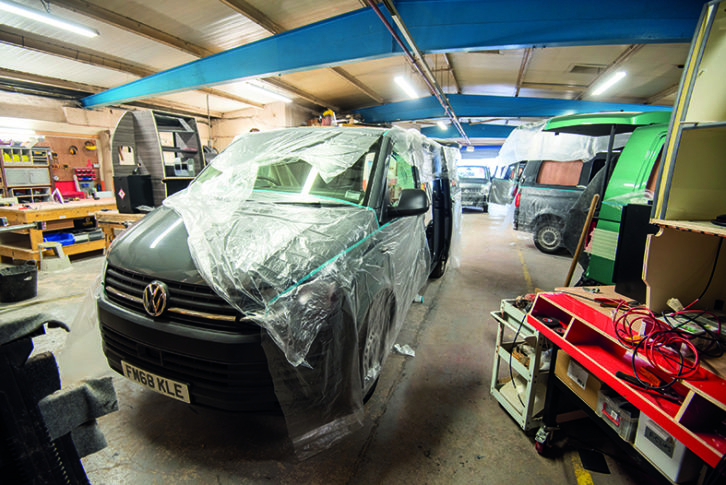 Andy's van in mid-conversion, one of a number in the workshop at the time