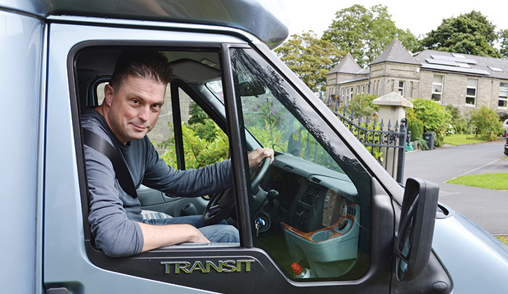 Peter Baber at the wheel of a 'van