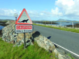 Unique road signs mark many of the causeways on Uist