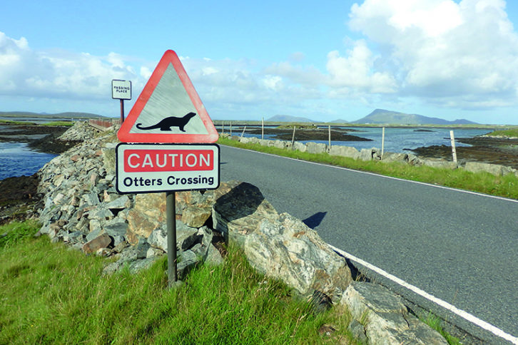 Unique road signs mark many of the causeways on Uist