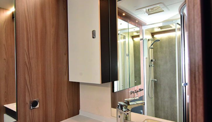 Stylish washroom has plenty of storage space and a new, improved handbasin design
