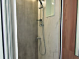The shower cubicle is a good size and is fitted with a large roof vent