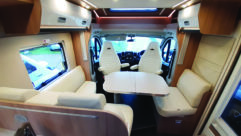 Swivel the cab seats for a comfortable lounge, with a table that is large enough to seat six