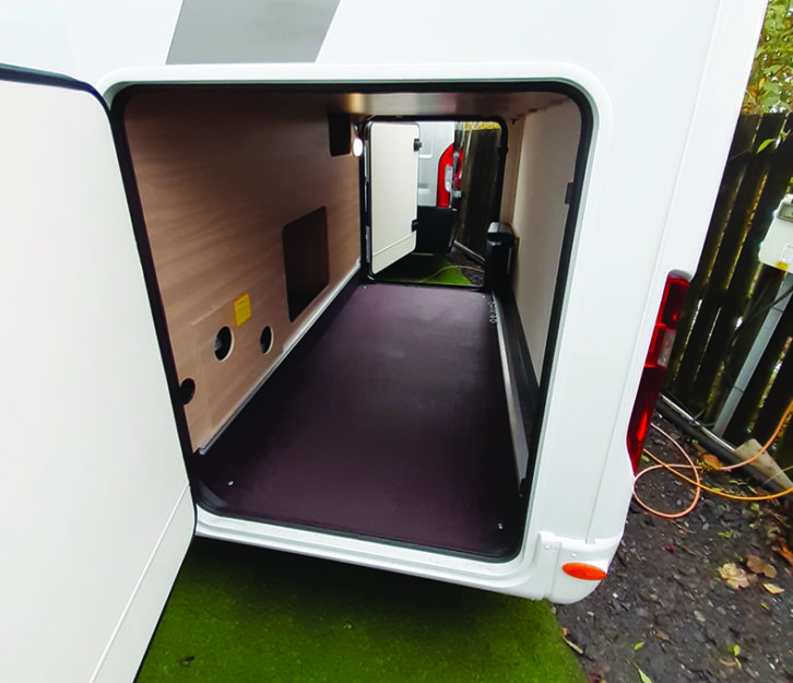 Garage is big enough to store two bits and fitted with lights and bike holds