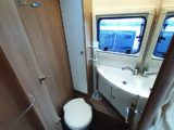 Washroom straddles the 'van, with the toilet area opposite the shower cubicle...