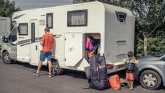 A motorhome being loaded up with the essential items to take on tour