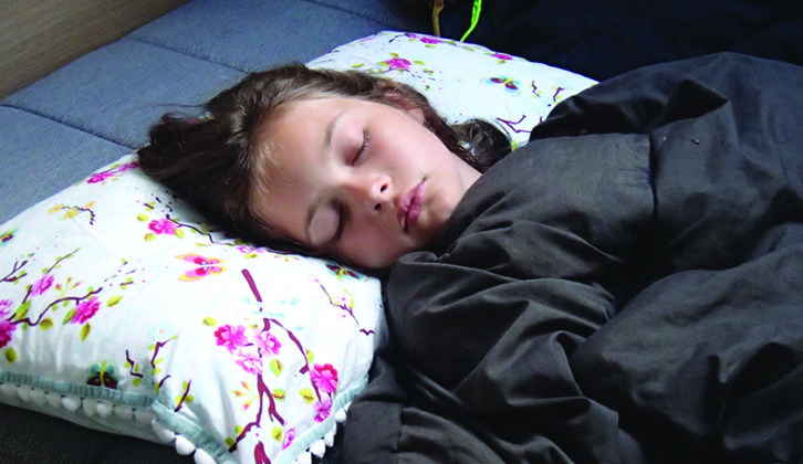 Many children prefer to use a sleeping bag when they're on holiday