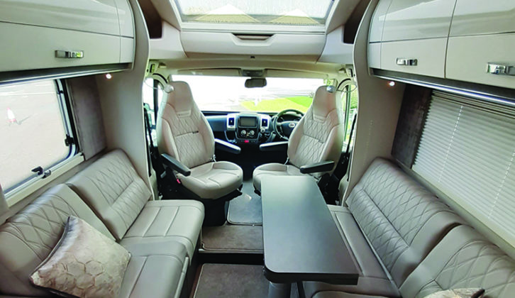Inspired by business jet décor, elegant interior combines silver-grey and high-gloss white