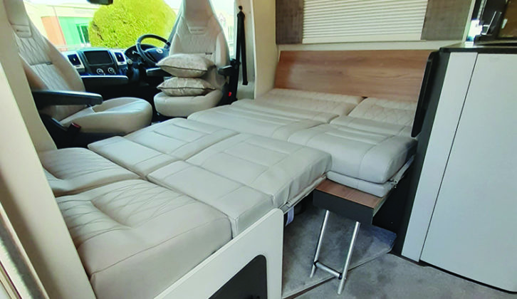 Lounge seating slides forward to make up front double bed