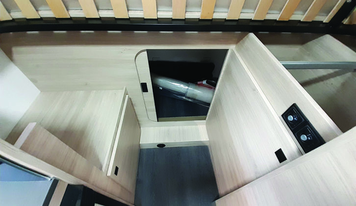 Fold up the bed and you can easily access the rear garage from inside