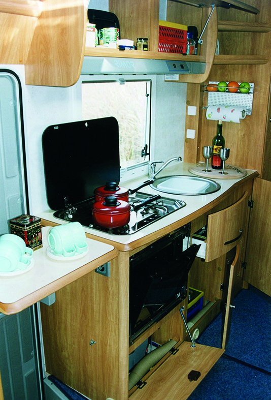 Nearside kitchen proved practical, although there was no draining surface for washed-up crockery and cutlery. I just used a tea-tray!