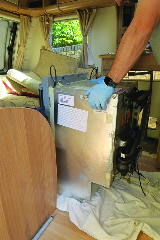 In a full service, the engineer needs to remove the fridge to access the rear