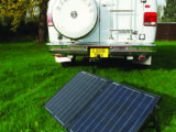 Portable folding panels are the easiest way to fit a solar panel and can be angled to the sun and moved between vehicles