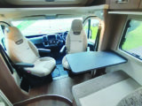 The cab seats swivel to face the table in the front dinette