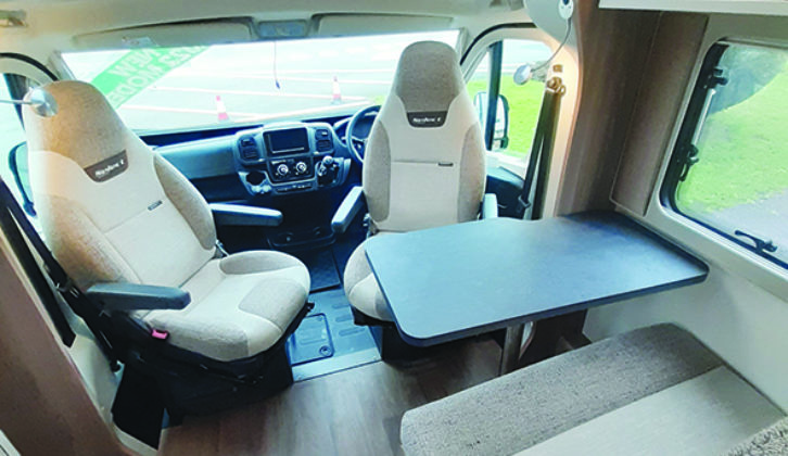The cab seats swivel to face the table in the front dinette