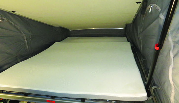 Upstairs bed is easily reached using the clip-on ladder