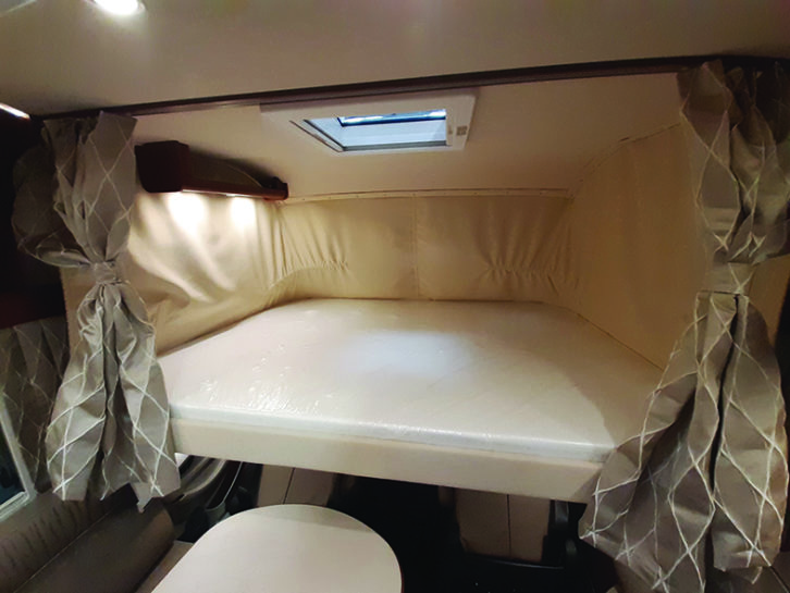 Drop-down bed over the cab is a good size and well lit