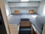 Single beds at the rear are 2m long, and easily convert to make up a huge double if you prefer