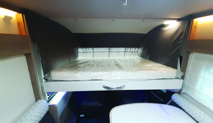 Drop-down bed is easy to manage and a comfortable 1.3m wide