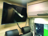 TV is located above the rear seats; satellite is also included