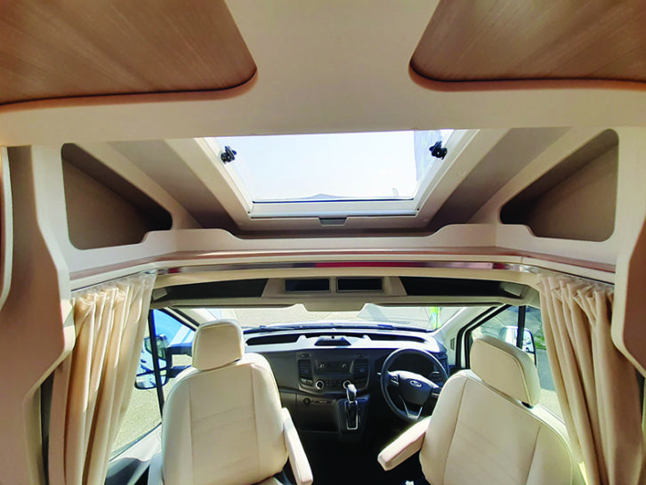 Standard Ford cab with sunroof and handy cubbyholes for maps