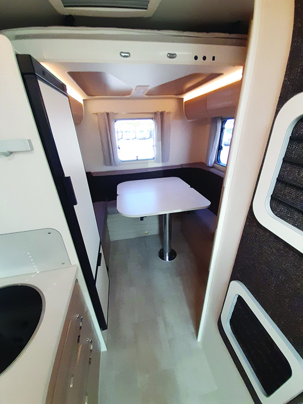 U-shaped rear lounge provides an impressively large table