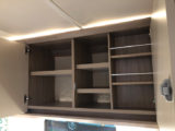 Plenty of storage in the kitchen, with cupboards and shelving