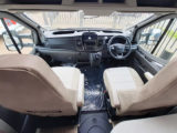 Standard Ford cab interior with drinks holders in the corners