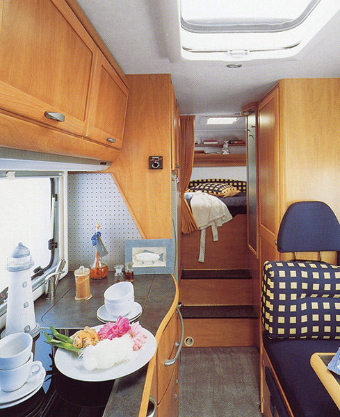 A 2001 Hymercamp 644G with raised permanent double bed above exterior