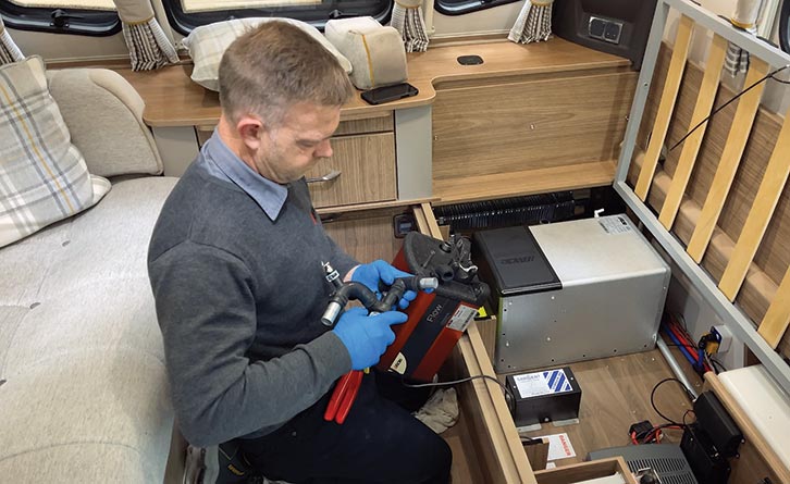 Phil constructing the bespoke plumbing
